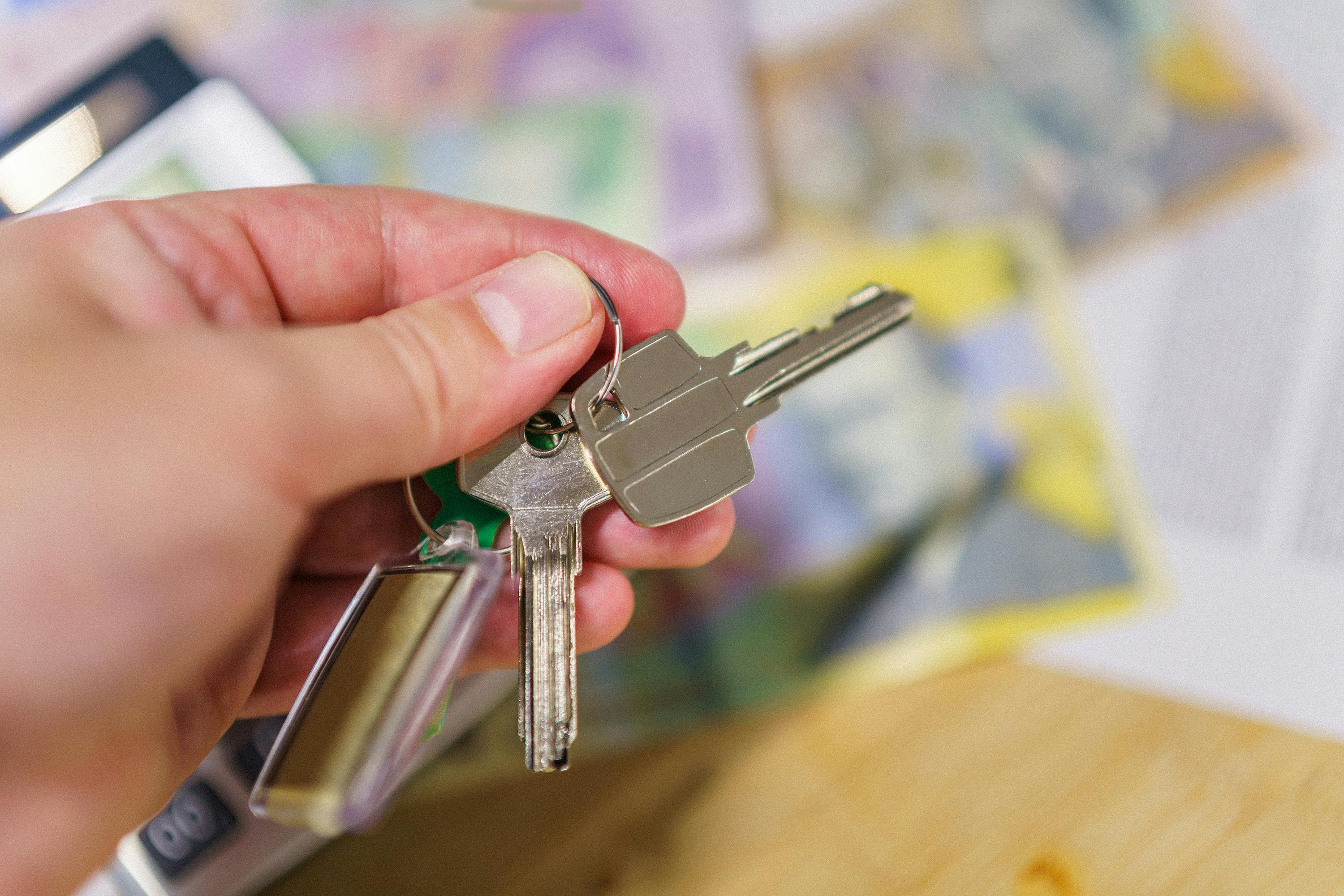 person holding keys